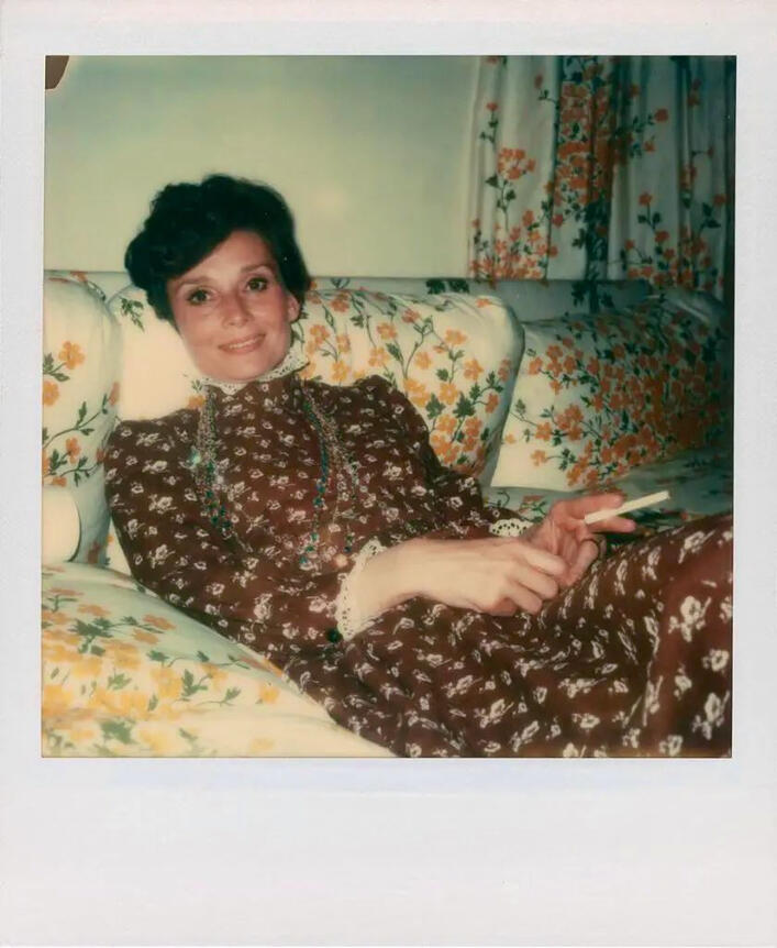 Audrey in a floral dress.